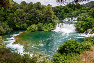 Fototapeta na wymiar Amazing cascade waterfalls of Krka National Park in Croatia
