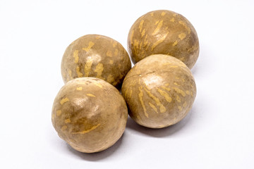 Macadamia nuts in whute background in Brazil
