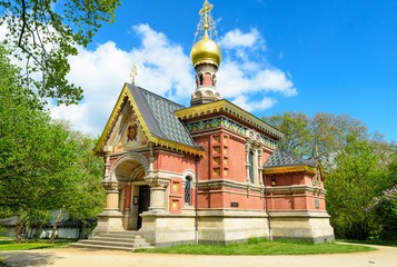 Fototapeta na wymiar Beautiful russian orthodox Church in Kurpark Bad Homburg. The first stone built by last Emperor Czar Nikolai II. Hessen, Germany