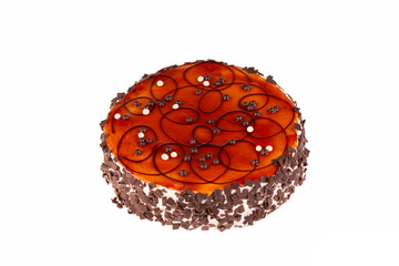 Caramel cake with chocolate on white background