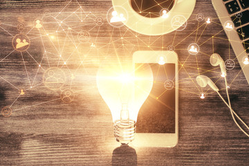 Double exposure of social network theme drawing over table with phone. Top view. People connecting concept.