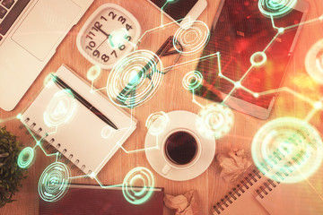 Double exposure of social network theme drawing over table with phone. Top view. People connecting concept.