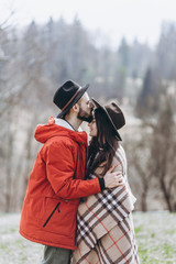 13.07.2018 Yaremche, Ukraine: loving couple, stylish bearded man and attractive woman cuddling on a walk