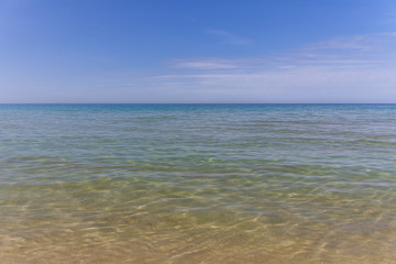 Fototapeta na wymiar Caspian Sea. Clear sea water. The sea is blue with small waves. selective focus