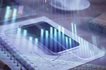 Double exposure of forex chart drawing and cell phone background. Concept of financial data analysis