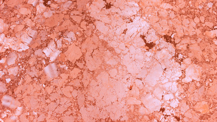 Abstract background of orange paint that looks like marble