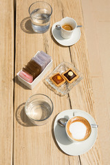 Coffee served on a restaurant table, top view