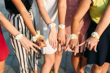 group of women holding hands