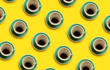 Cups of hot coffee on color background