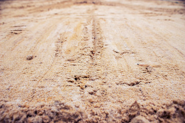 Background of a dry layered road close up