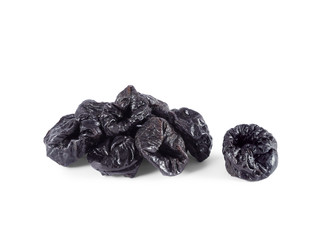 Heap of dried prunes isolated on white background. Healthy snack.