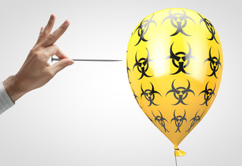 Concept: anthropogenic factor in the spread of infection. Balloon with biohazard symbols and a...