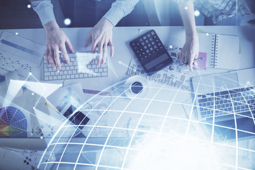 Double exposure of man and woman working together and world map hologram drawing. international network concept. Computer background. Top View.