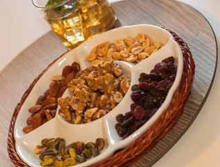 nuts and a glass of iced tea