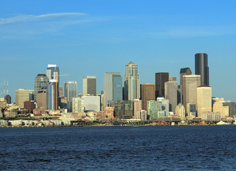 Fototapeta na wymiar View From The Sea To The Waterfront Skyline Of Seattle