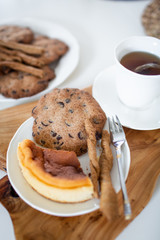Healthy and delicious gluten free cakes and cheesecake served with tea in a cup