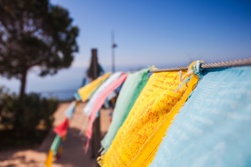 Prayer flag. Colourful buddhist prayer flags at boudhanath stupa in Benalmadena, Andalusia, Spain.