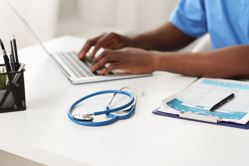 Fototapeta premium Stethoscope on doctor's table in clinic
