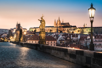 Fototapeta na wymiar Charles bridge during sunset - empty due to coronavirus pandemic, Prague, Czech Republic