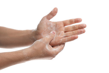 Man washing hands with soap on white background, closeup