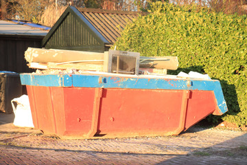 Loaded garbage dumpster