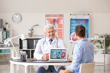 Obraz premium Young man visiting urologist in clinic