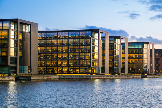 modern buildings on Copenhagen embankment, evening view