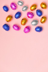 Fototapeta na wymiar Sweet chocolate eggs on color background
