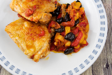 Chicken with peppers, olives and cherry tomatoes