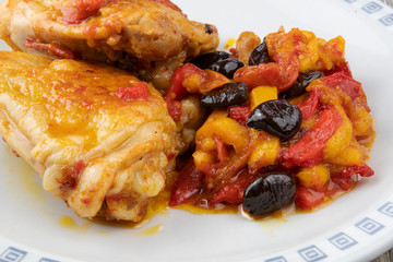 Chicken with peppers, olives and cherry tomatoes