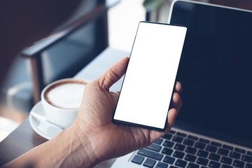 Mockup of man using smartphone in cafe