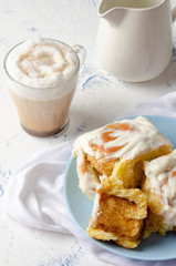 hot drink and cinnamon rolls for