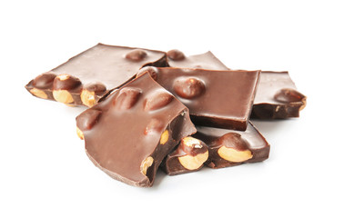 Sweet chocolate with nuts on white background