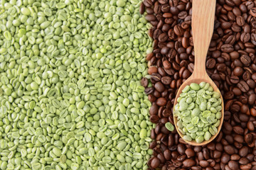 Spoon with roasted and green coffee beans