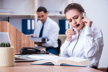 Obraz premium Call center operators working in the office