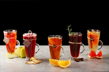 set of tea in mulled. autumn traditional drinks, set punch and mulled wine on christmas. isolated on black