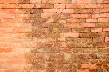 Background of wide old red brick wall texture. Old Orange brick