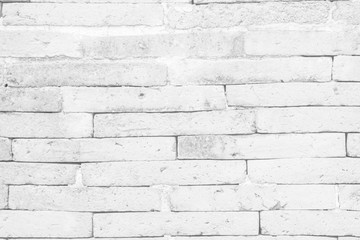Fototapeta premium White brick wall texture background in room at subway. Brickwork