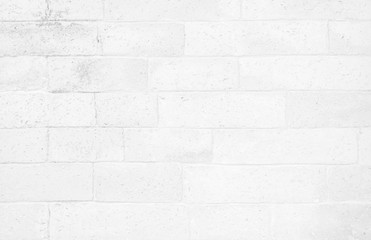 White brick wall texture background in room at subway. Brickwork