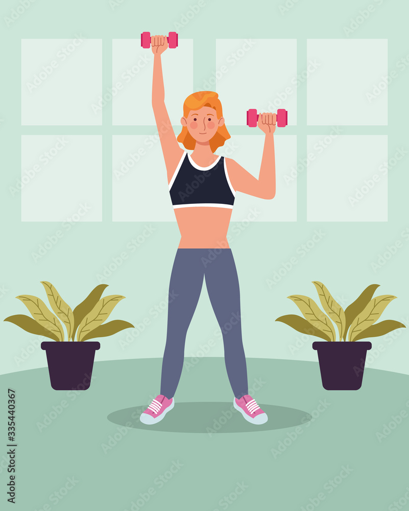 Wall mural woman lifting dumbbells in the house