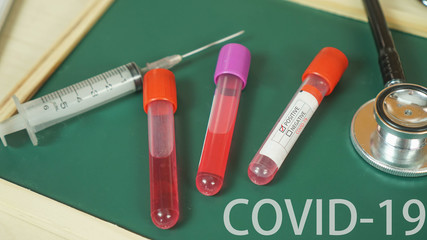 Coronavirus COVID-19 infected blood sample Test tube with blood sample for COVID-19 test, novel coronavirus 2019 prevent virus and plague infection