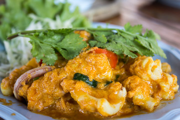 Thai food. Stir fried squid powder. Served on a plate. Very tasty in Thailand.