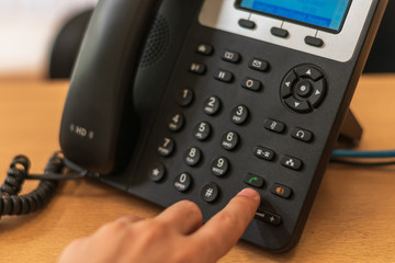 landline of an office or workplace where there is internal communication

