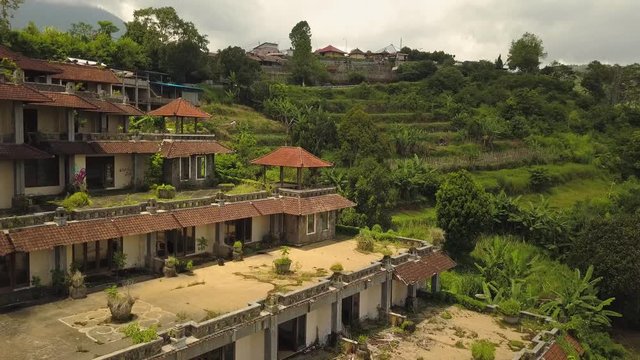 Aerial drone video of abandoned hotel in Bedugul, Bali island.