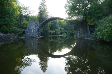 Fototapeta na wymiar Rakotzbrucke Devil Bridge in Germany
