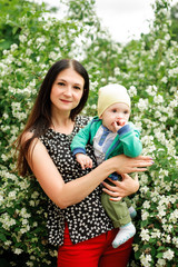 Fototapeta premium mom with baby boy in the park