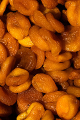Dried apricots. Macro. Heap of dried apricots close-up.
