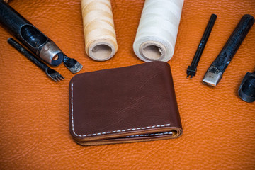 Genuine cowhide leather wallet handmade with tool top view