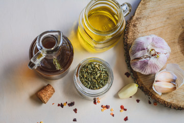 Natural seasonings like garlic, olive oil, parsley and dried pepper seeds.
