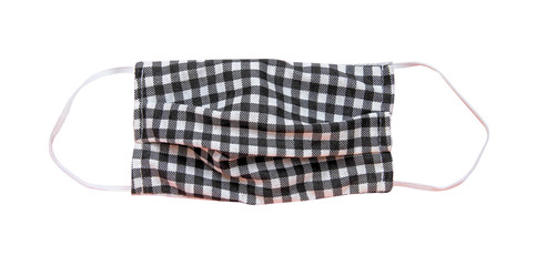 Fabric mask with rubber ear straps isolated on white background and clipping path